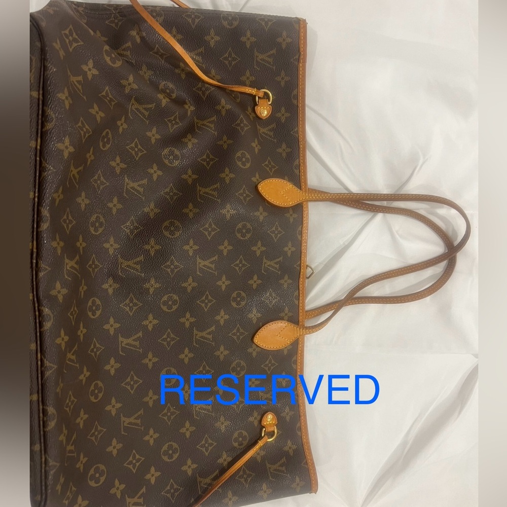 Heavily used Louis Vuitton Neverfull GM